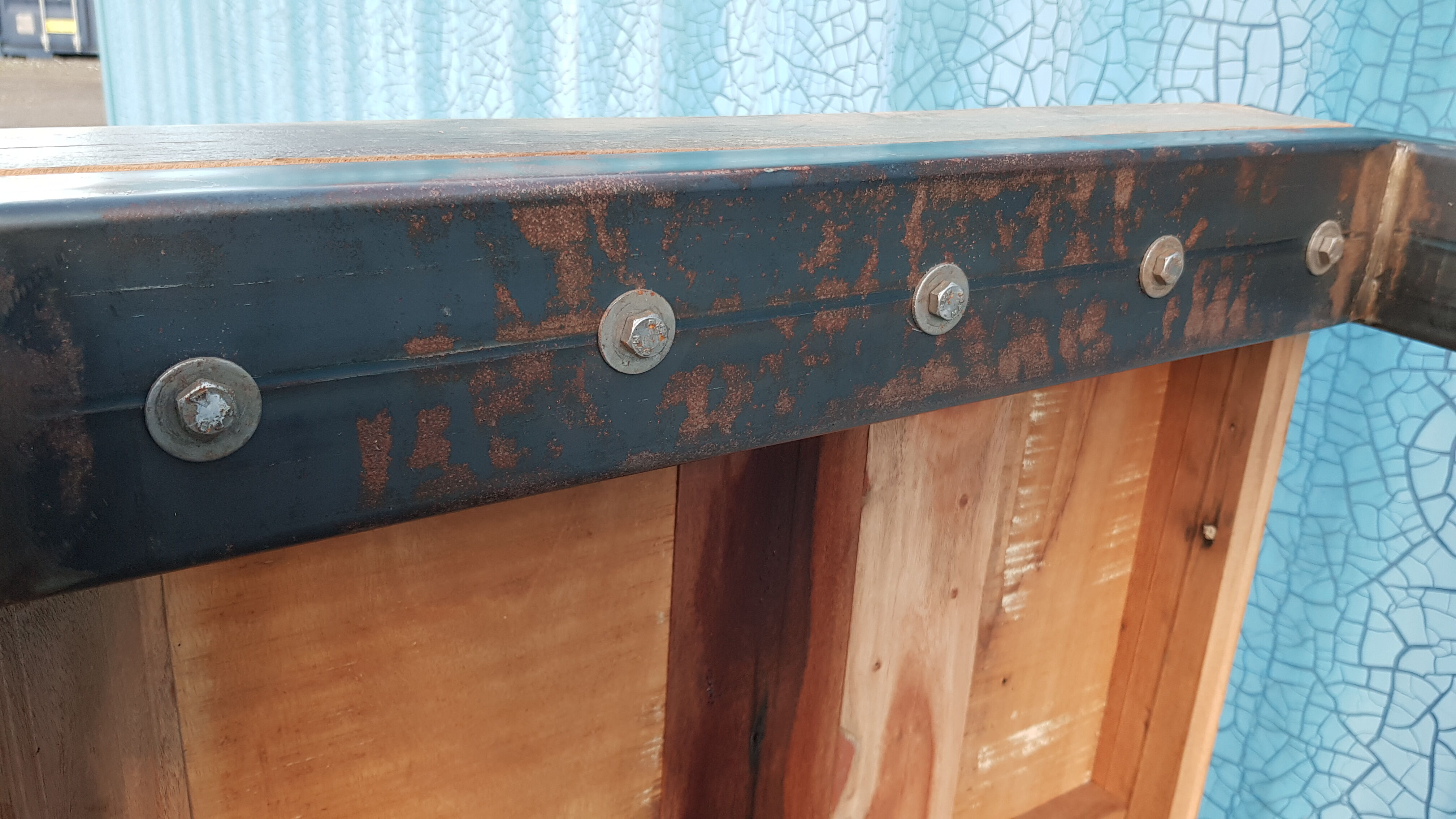 Industrial coffee table with wooden top and metal legs