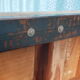 Industrial coffee table with wooden top and metal legs