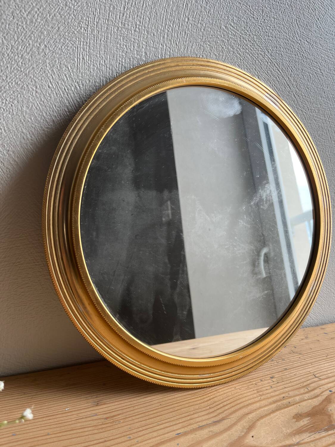 Vintage gold round mirror