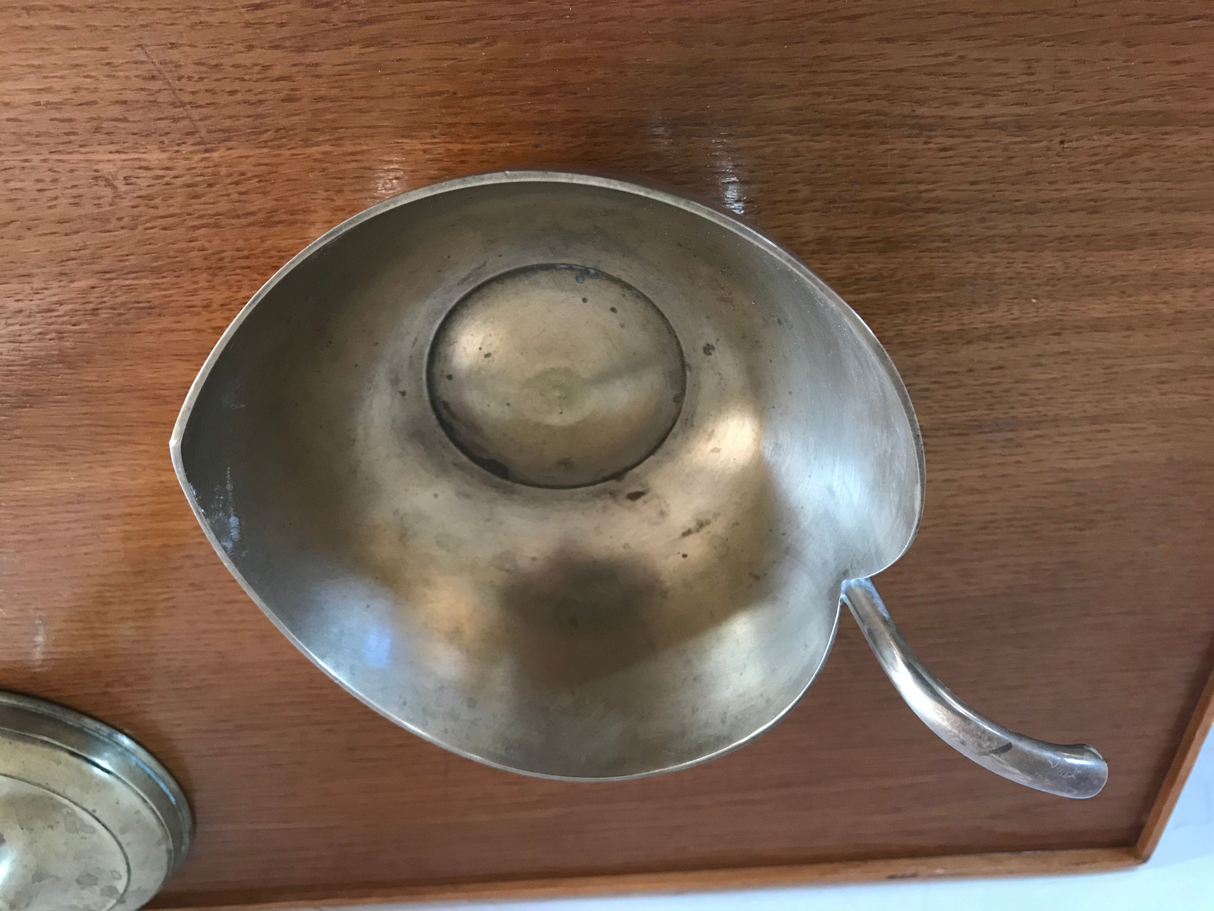 Empty brass apple pocket