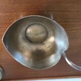 Empty brass apple pocket