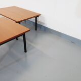 Suite of two vintage modernist Isa coffee tables in teak and black metal from the 60s