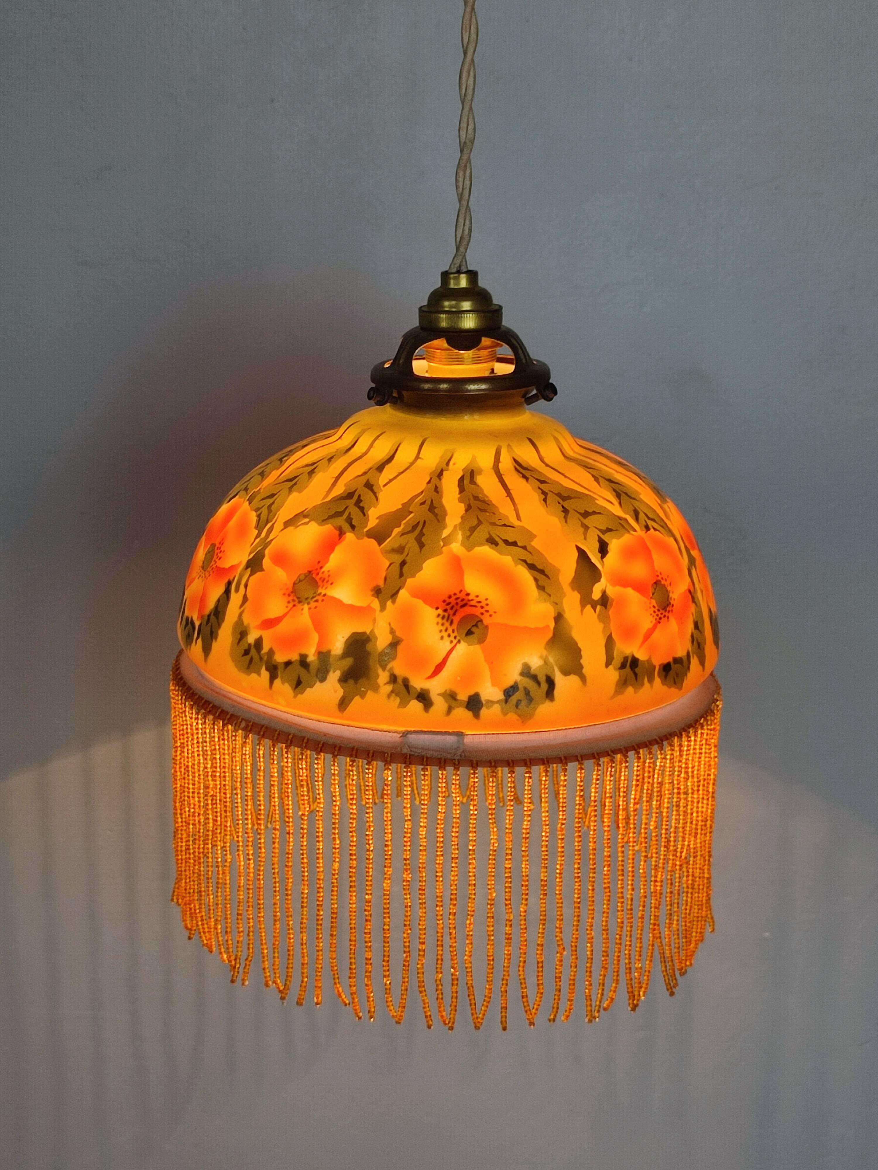 Old opaline and its tassels hanging lamp
