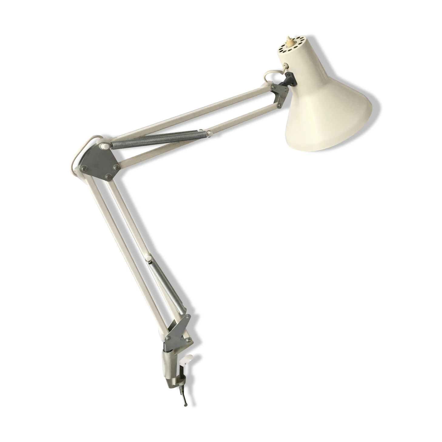 Off-white articulated architect lamp.