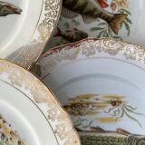 11 vintage Limoges porcelain fish plates