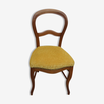 Louis Philippe period chair trimmed with yellow velvet in wood