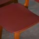 Ensemble de 4 chaises design chêne et skaï rouge 1960's