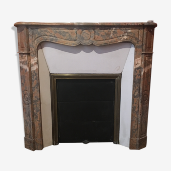 Old red marble fireplace