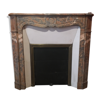 Old red marble fireplace