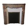 Old red marble fireplace