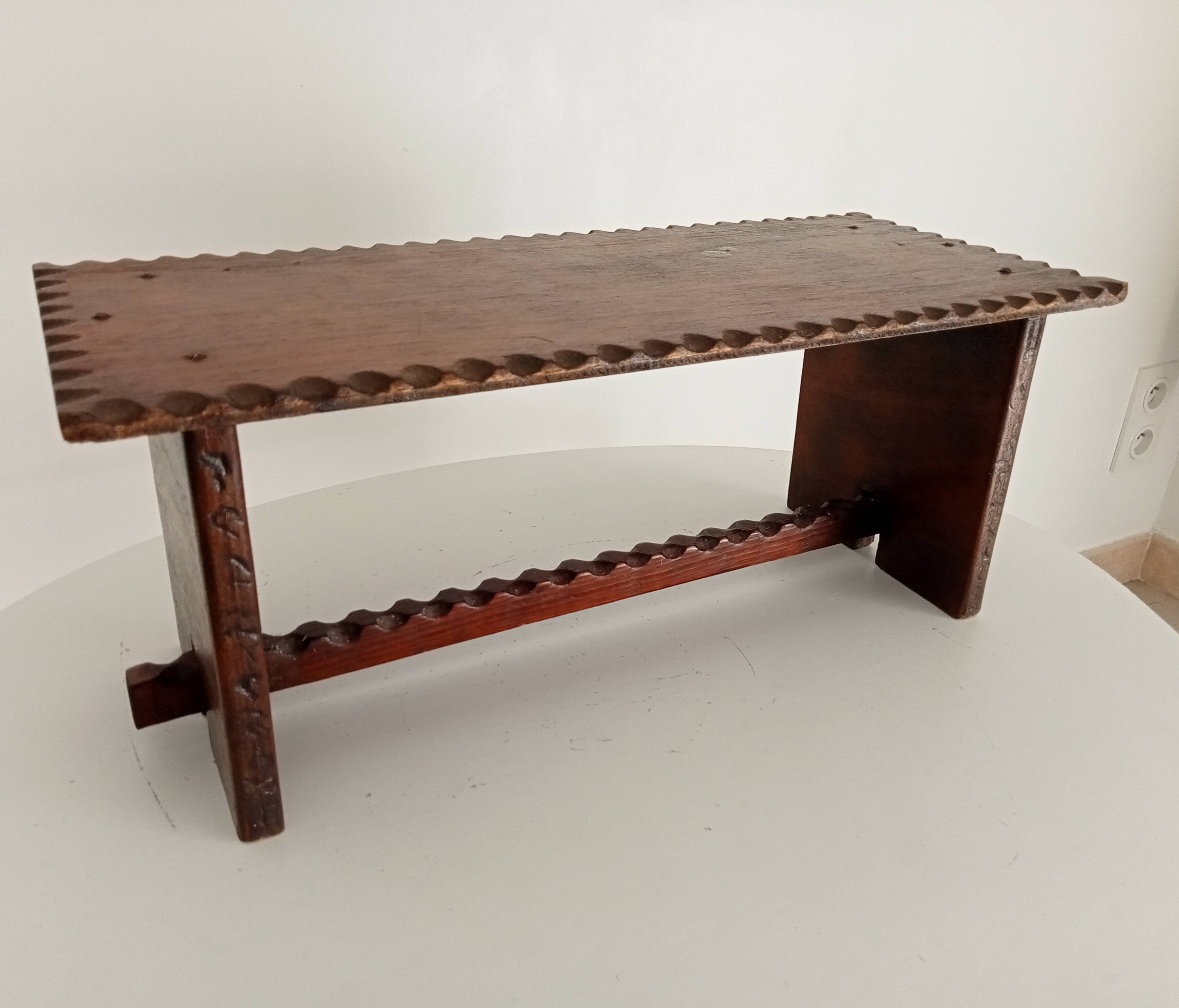Low brutalist stool in the style of Charles Dudouyt.
