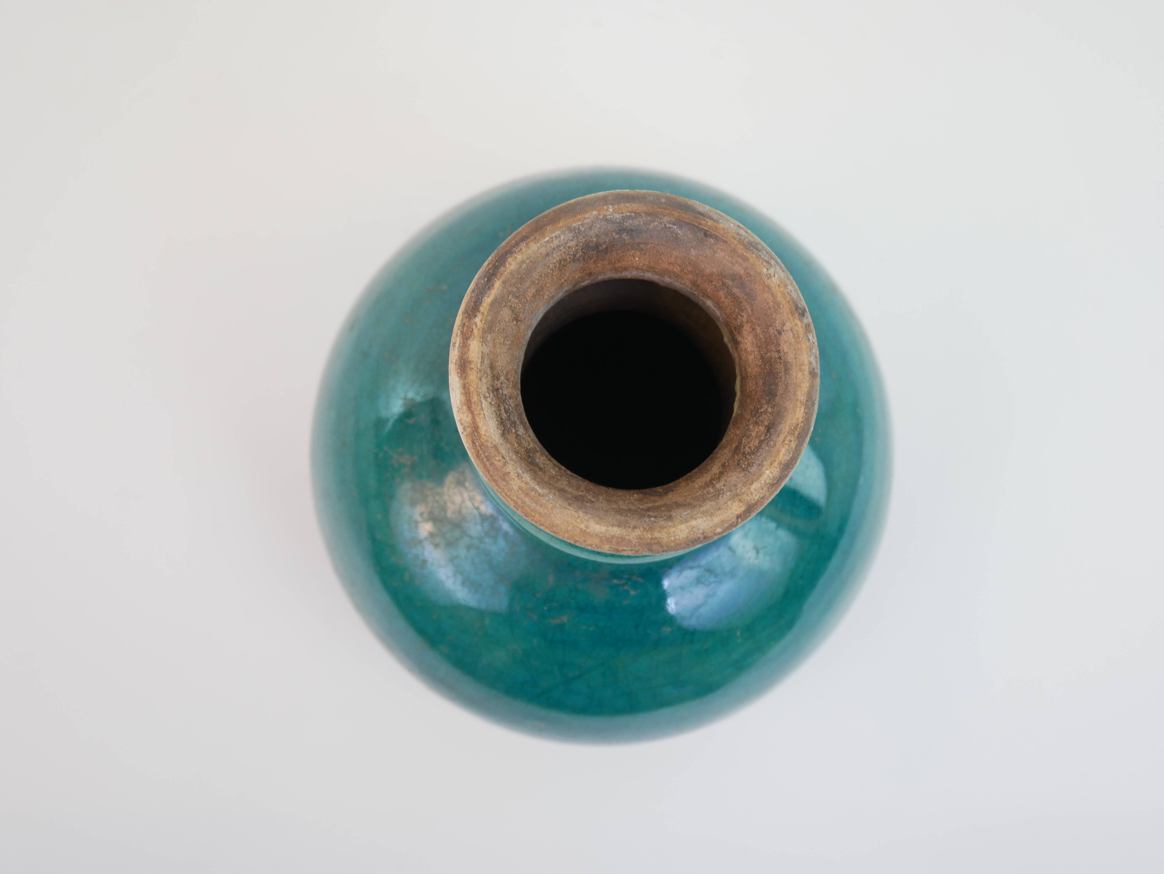 Small old blue ceramic vase