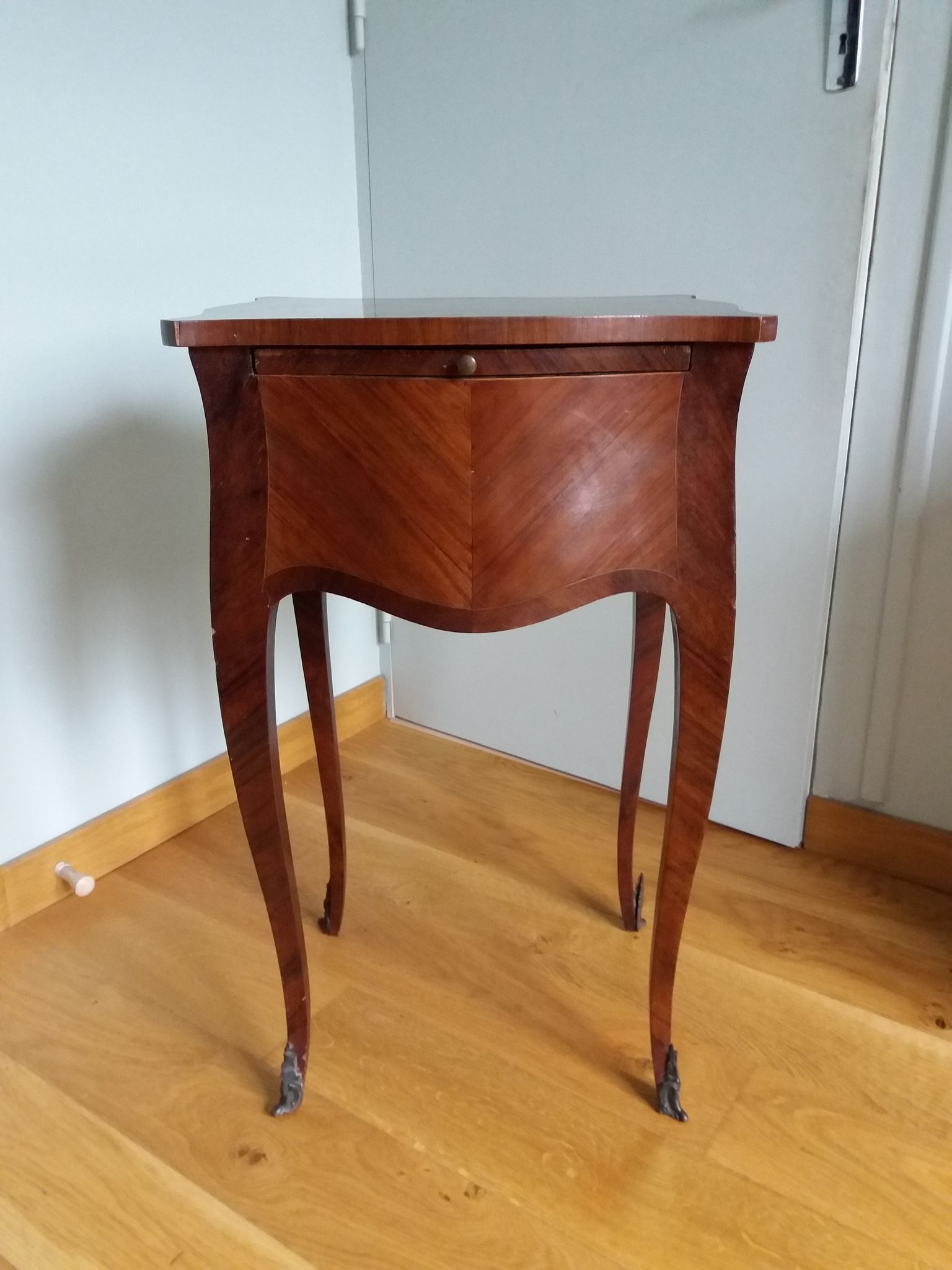 Nightstand with writing desk in Louis XV style.