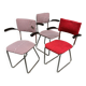 Set of 3 vintage cantilever chairs reupholstered.