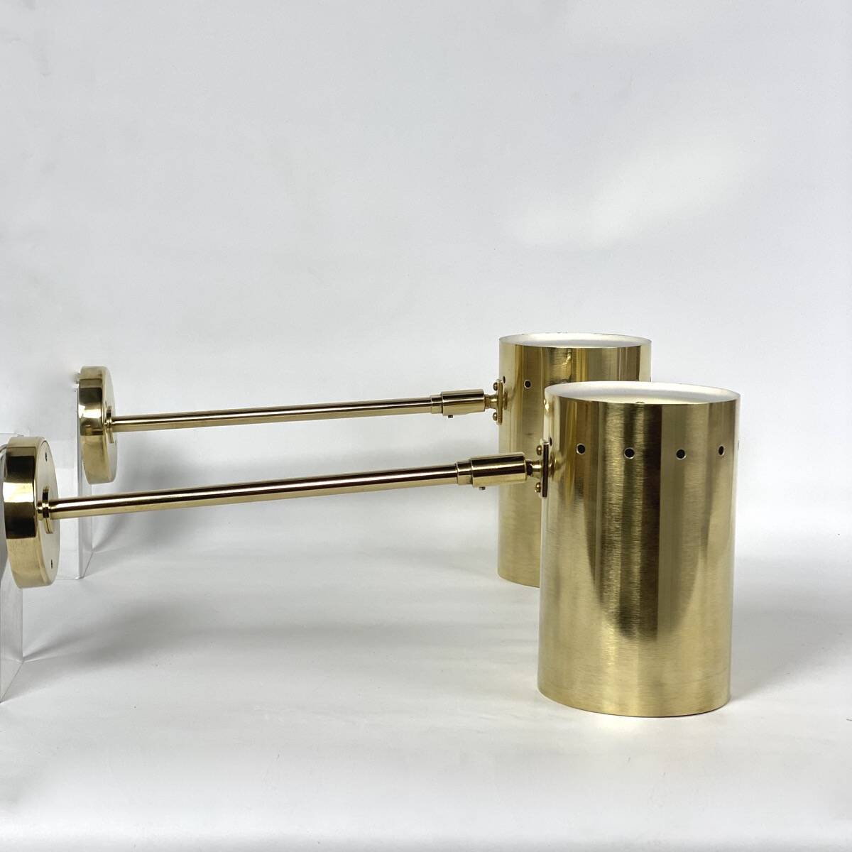 Large pair of brass wall or ceiling lights, 1960.