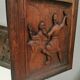Four old wooden carvings to hang on the wall.