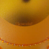 Guzzini orange wall clock from the 1980s