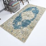 Tapis persan bleu et beige