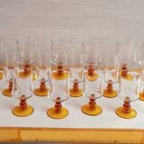 Service of 18 glasses with amber feet 70s