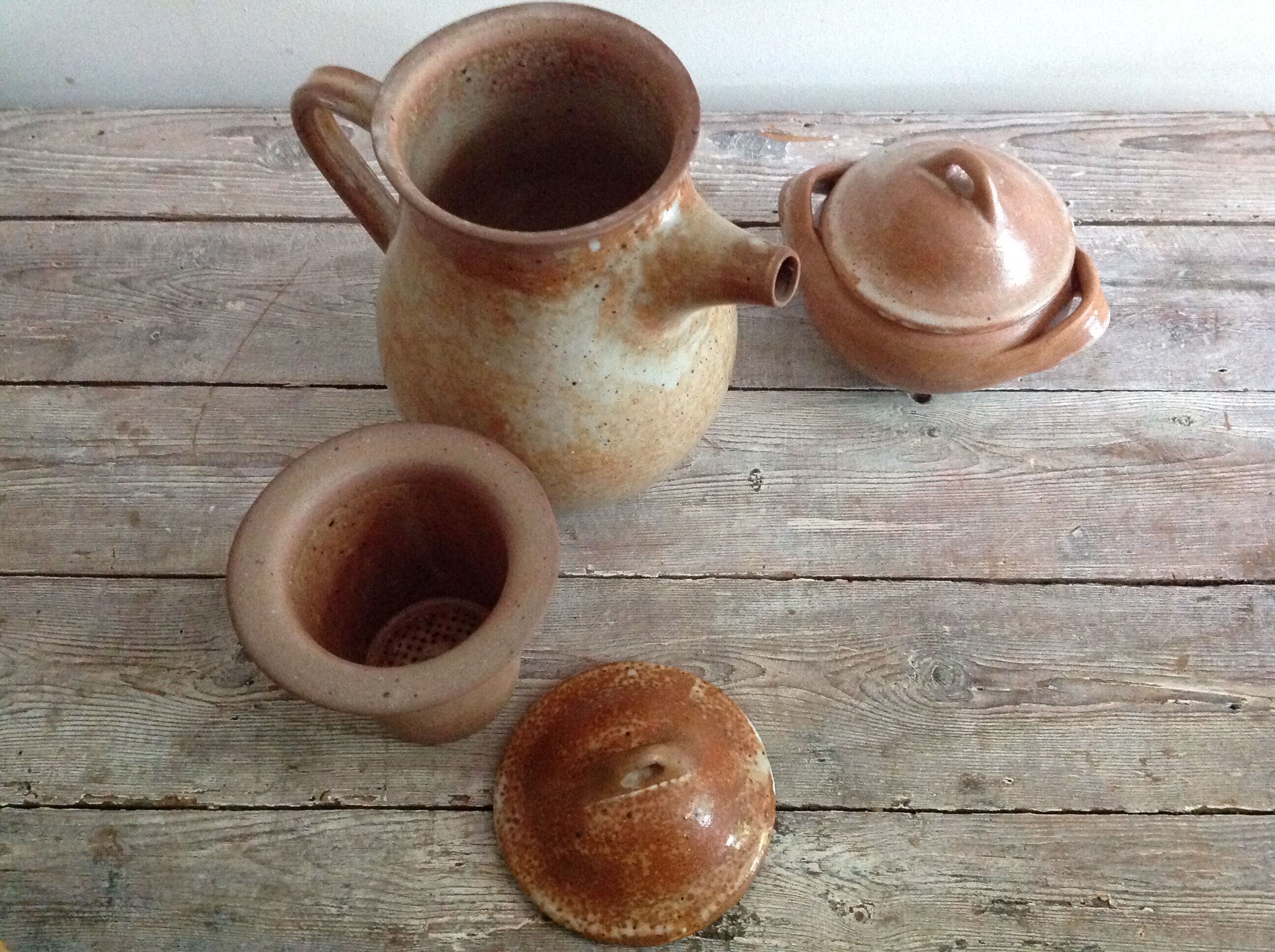 Teapot in reeds and its sugar bowl