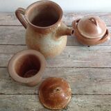 Teapot in reeds and its sugar bowl