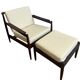 Scandinavian armchairs in solid teak with ottoman from the 1960s.