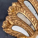 Palm-shaped faceted mirror
