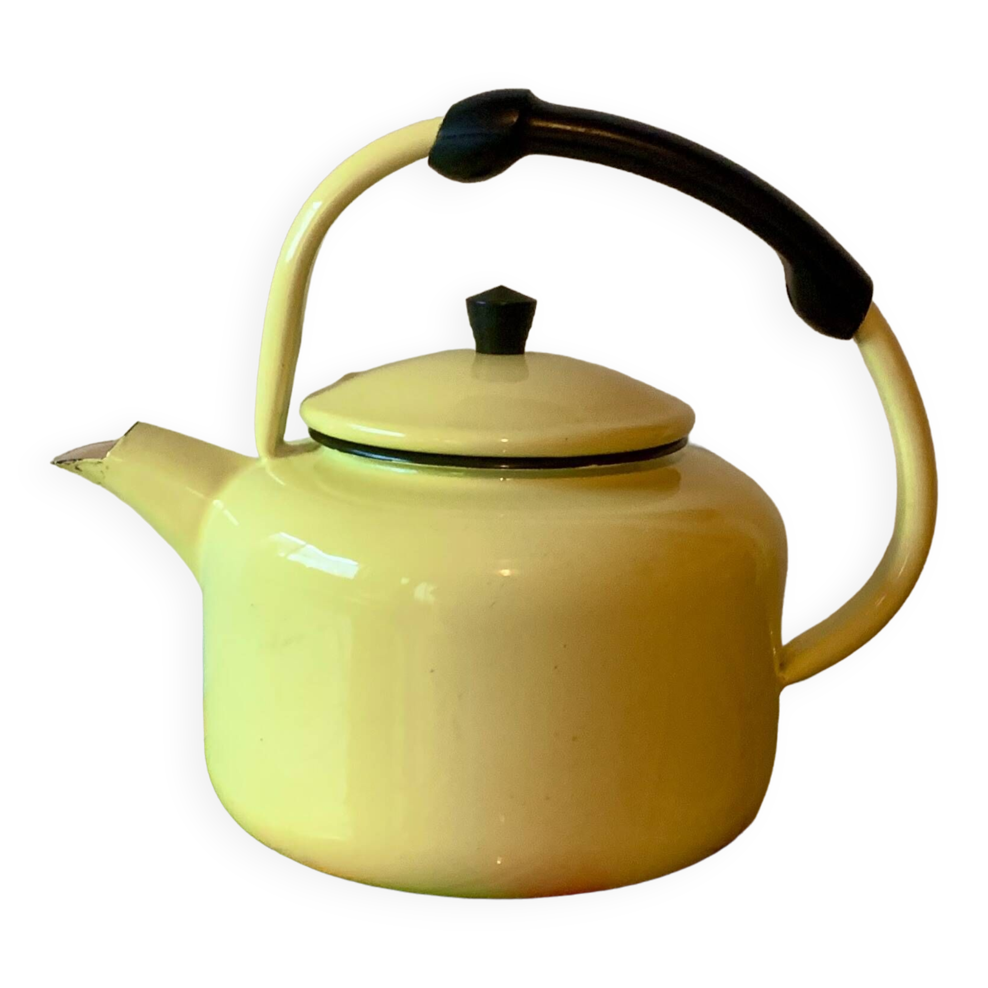 Old kettle in yellow enamelled sheet metal and Bakelite