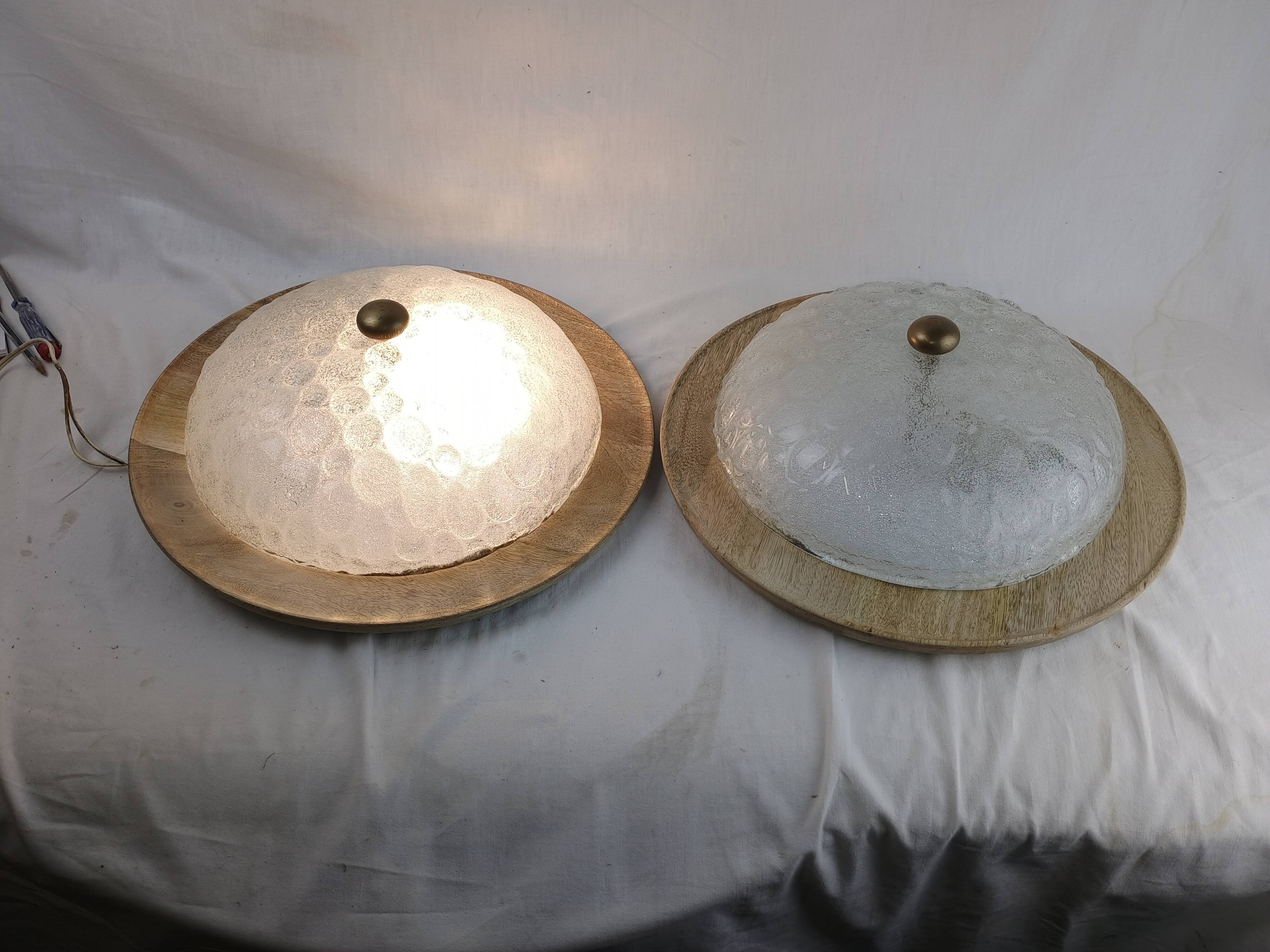 Pair of vintage Murano wall lights with exotic wood shelf.