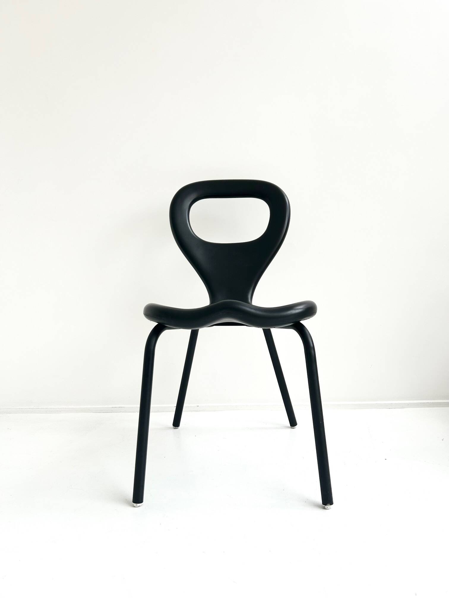 Pair of "TV chairs" by Marc Newson for Moroso 1993