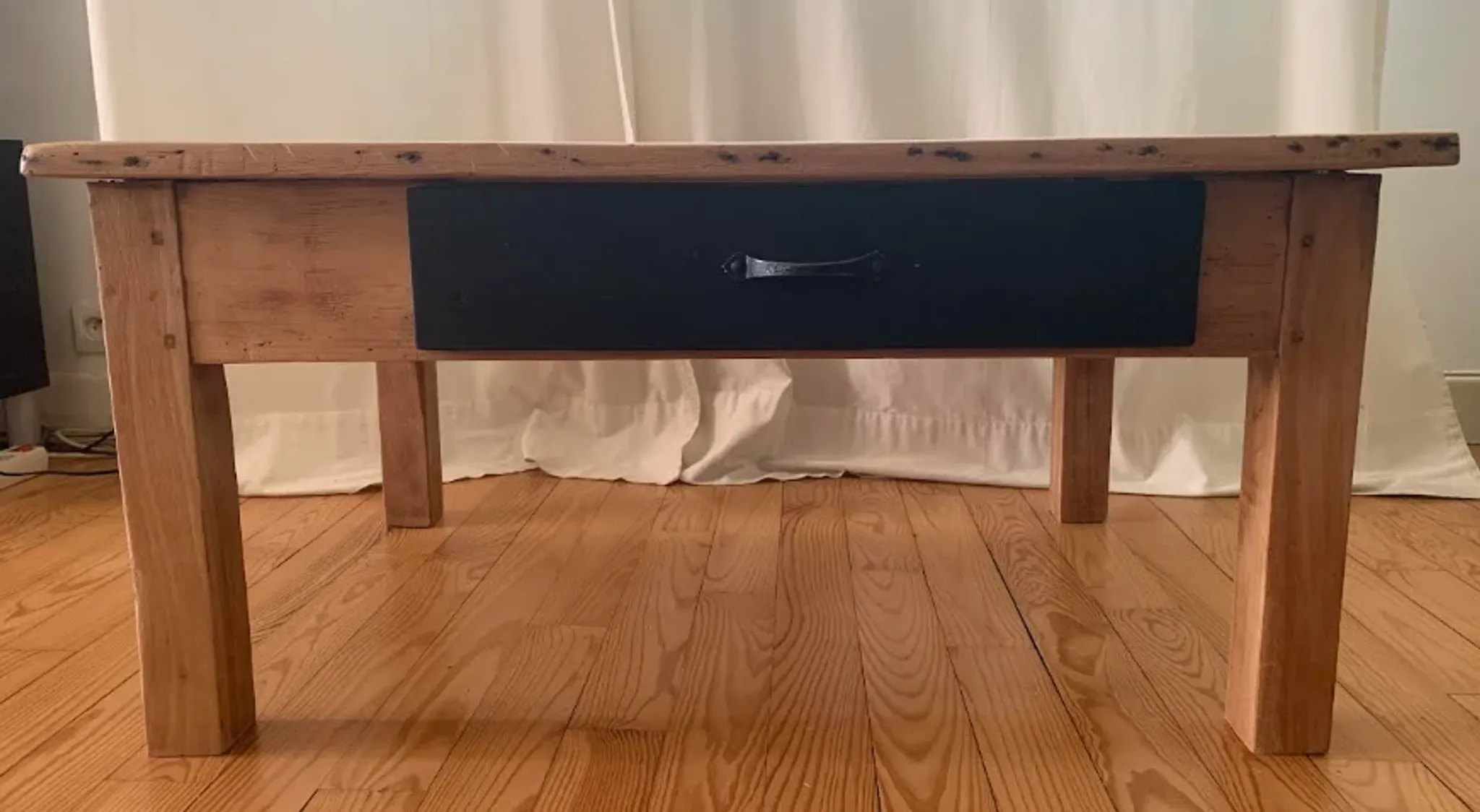 antique wooden coffee table with a patina