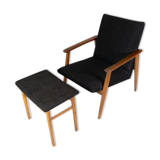 Easy chair with stool in teak and dark wool fabric of danish design from the 1960s.