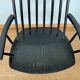 Armchair with armrests and Scandinavian bridge slats