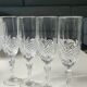 Lot of 4 large crystal flutes. Signed Arc. Height 20 cm.