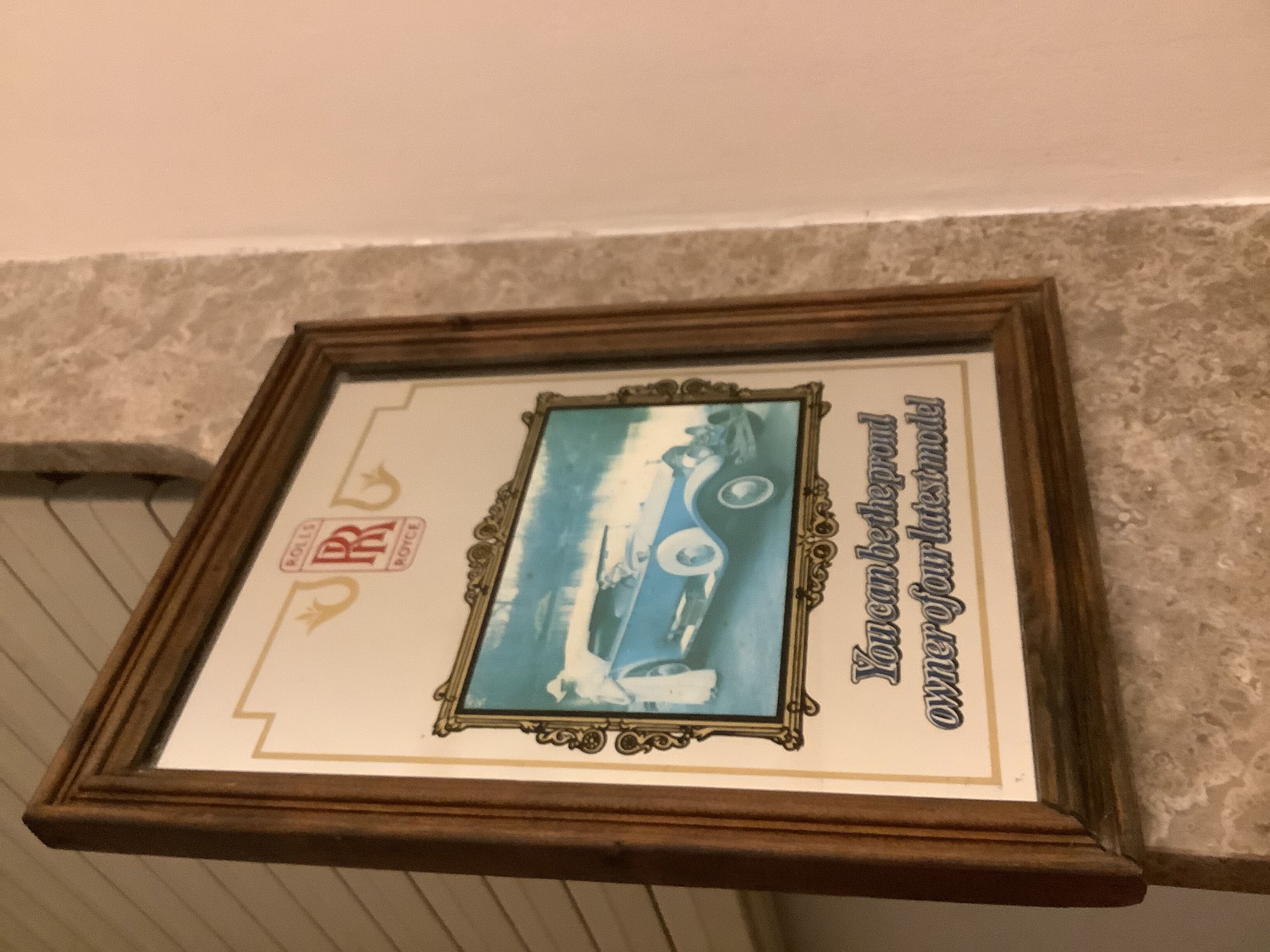 Mirror illustration of old Rolls Royce car