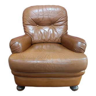 Antique club armchair in cognac leather