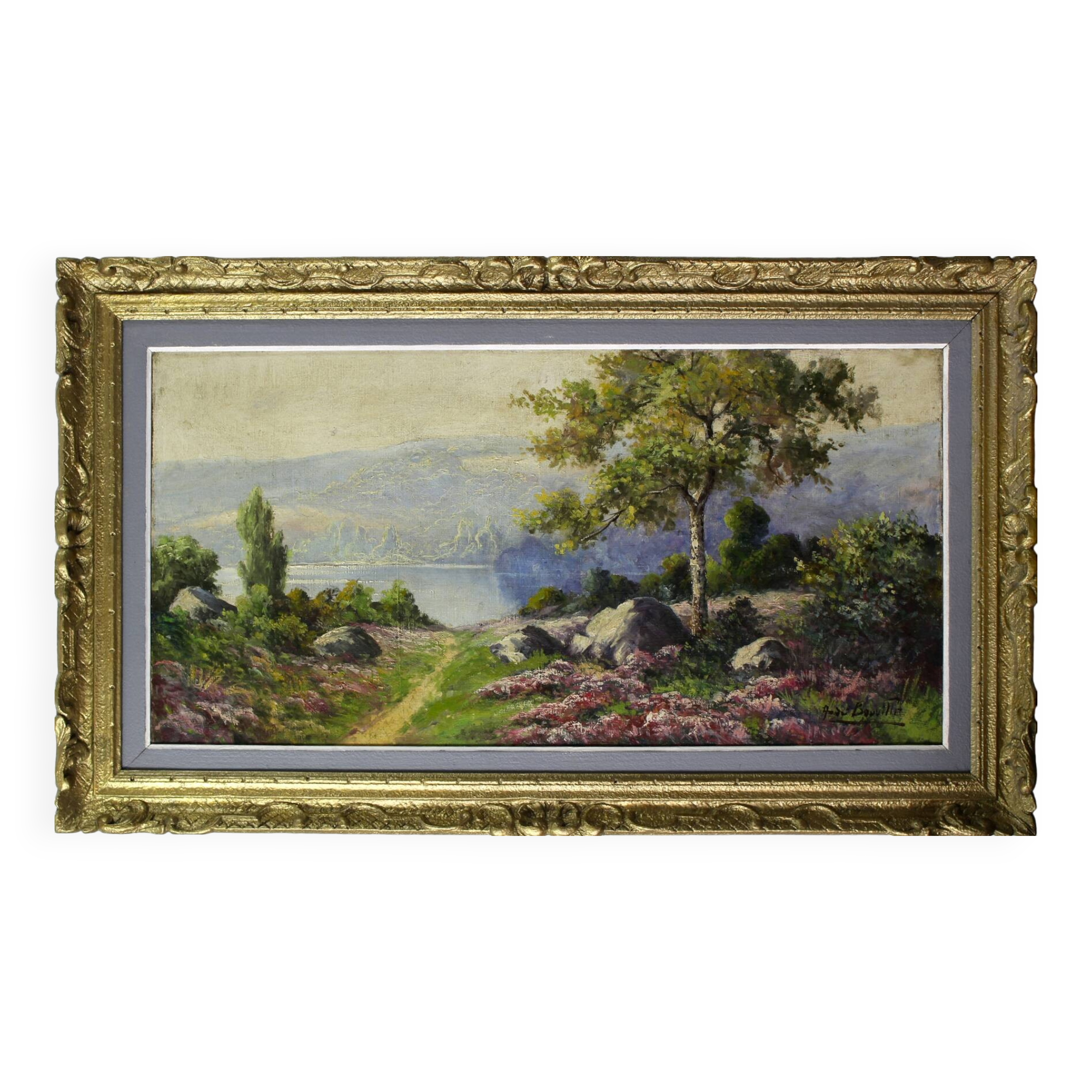 large painting of lake and countryside