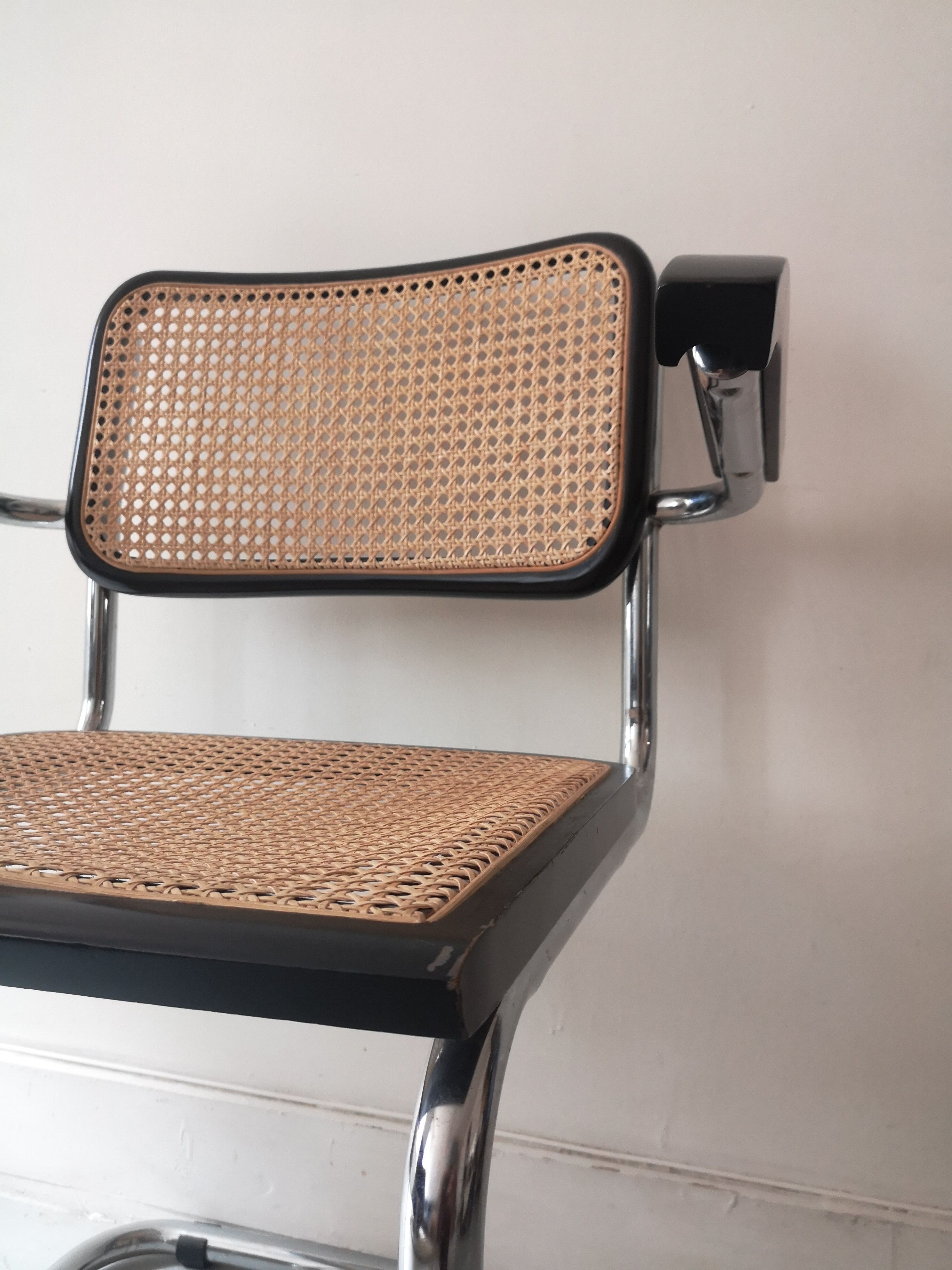 Cesca armchair with metal and wood armrest by Marcel Breuer