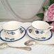 Antique cups with iron earthenware saucers