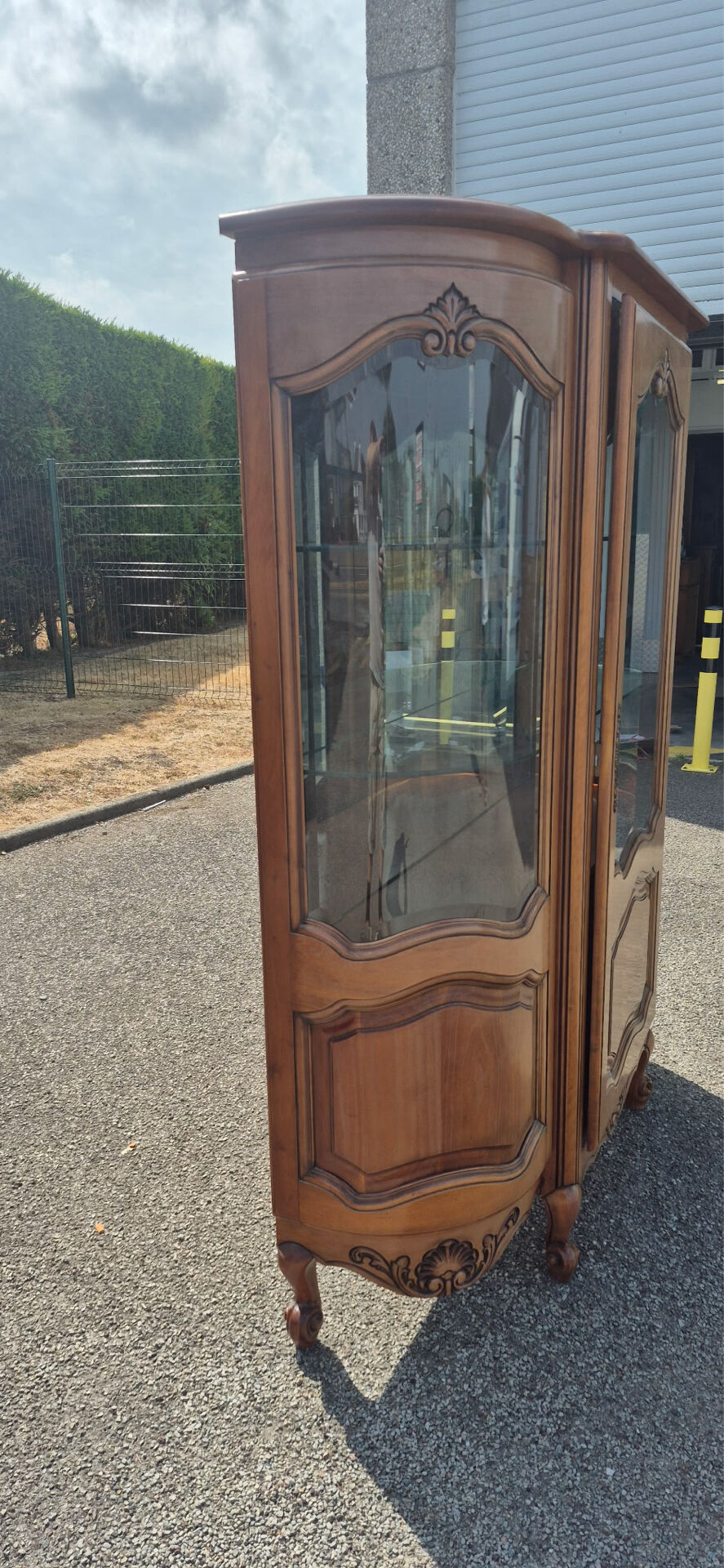 Large curved display cabinet in cherry wood in Louis XV style – 20th century