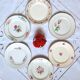 Antique dessert plates mismatched in earthenware with gilded edges