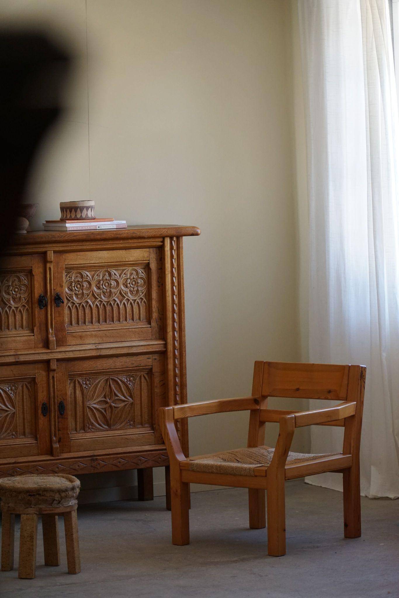 Tage Poulsen, a pair of brutalist chairs in pine and cord, Danish modern style, 1970s.