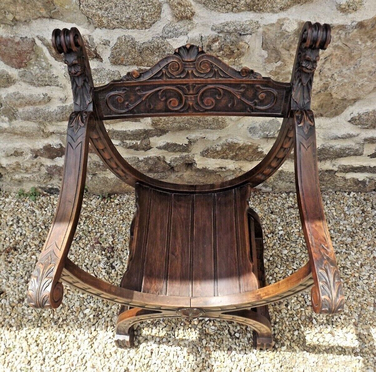 Dagobert armchair curule hard carved walnut demon head detail 3675