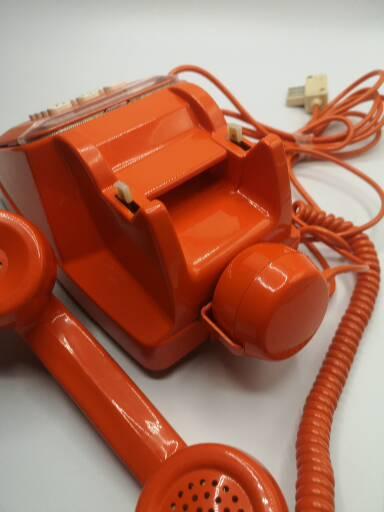 Vintage bakelite orange phone