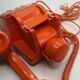 Téléphone bakélite vintage orange