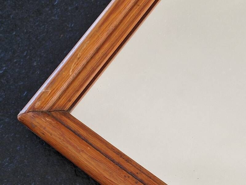 Carved wooden mirror from the Napoleonic III era in fir or pine from the 19th century.