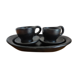 Terracotta service painted in black saucer cups and top