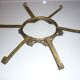 Ceramic plate underside on bronze stand