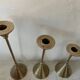 Set of three vintage brass candle holders