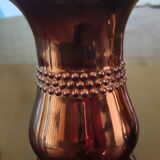 Curved bronze vases
